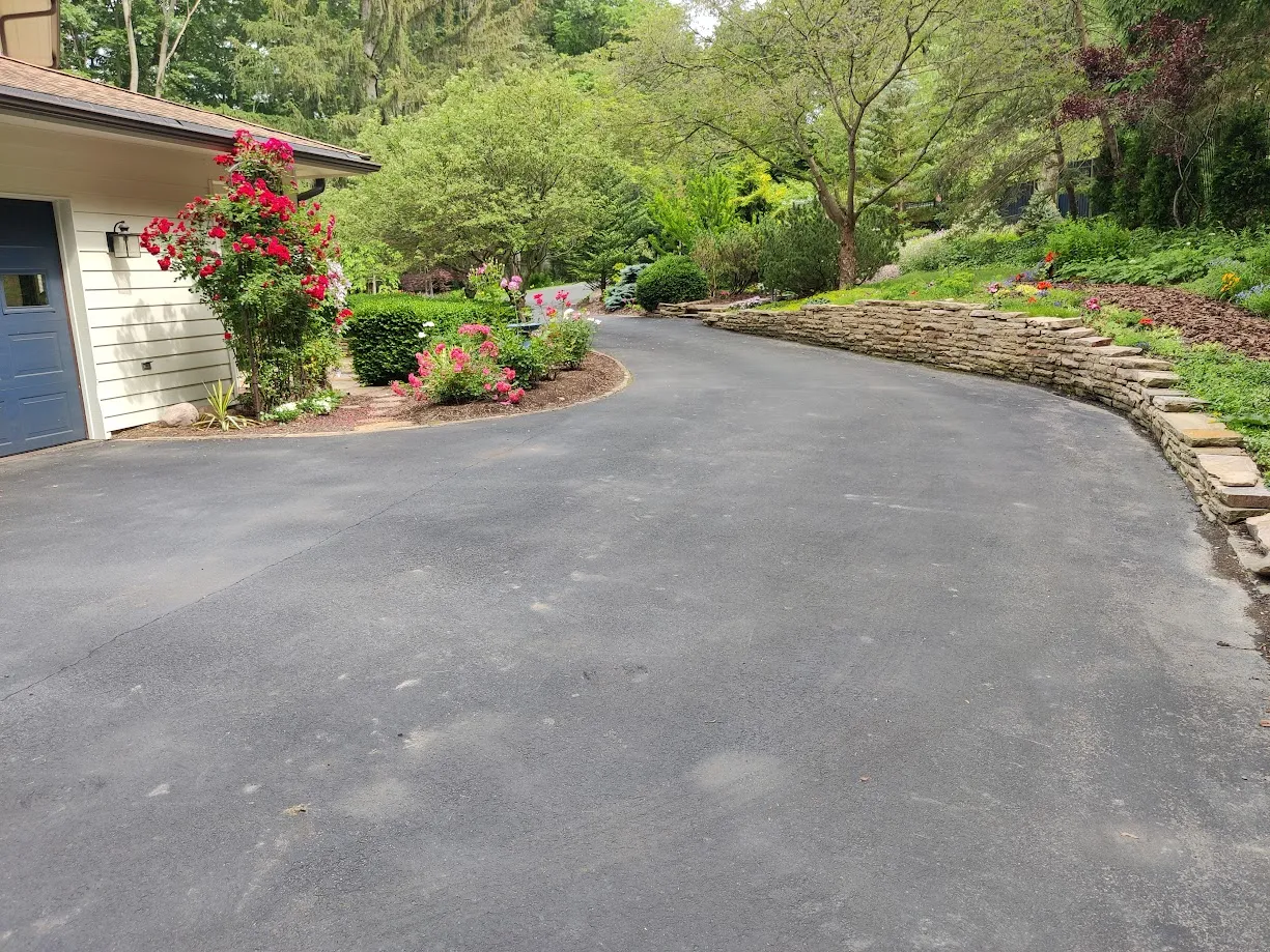 GrassMasters Landscaping front entrance driveway landscaping
